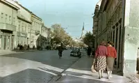 Ulica T. G. Masaryka s pohľadom na reformovaný kostol, Lučenec (1959)