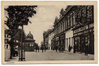 Ulica s obchodmi, kioskom a stromoradím, Lučenec (1930)