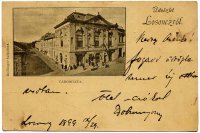 Radnica na nároží s ulicou, rukopisná pohľadnica, Lučenec (1899)